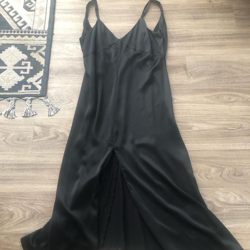 Black silk Reformation midi-dress.